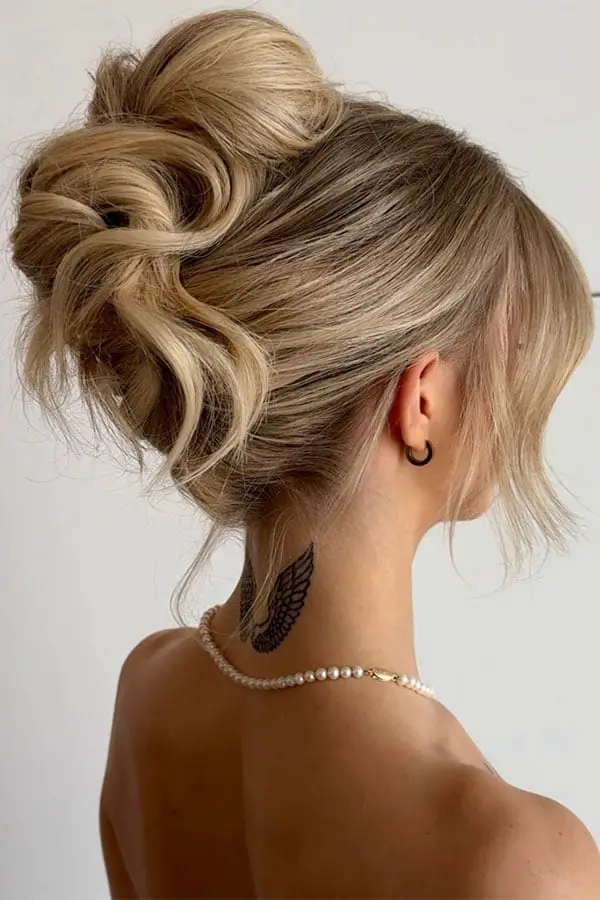 Voluminous Updo with Textured Curls Voluminous Updo with Textured Curls — Trendy Hair Up Hairstyles