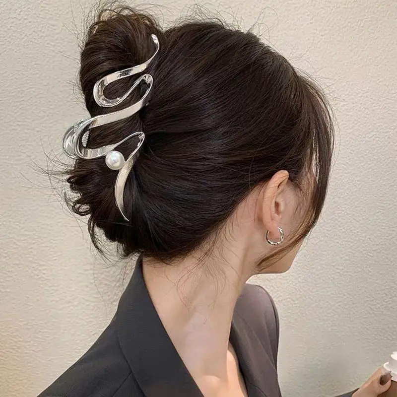 Sleek Bun With Metallic Snake Clip Sleek Bun With Metallic Snake Clip — Trendy Hair with Clips