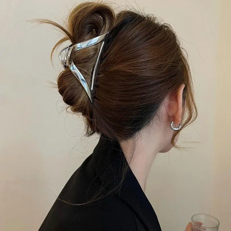 Messy Bun With Geometric Silver Claw Clip Messy Bun With Geometric Silver Claw Clip — Trendy Hair with Clips