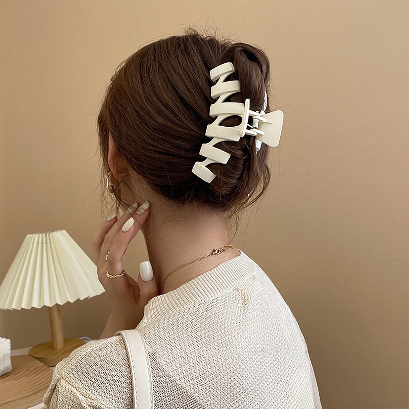 Shoulder Length Twisted Bun With Geometric Matte Clip Shoulder Length Twisted Bun With Geometric Matte Clip — Trendy Hair with Clips