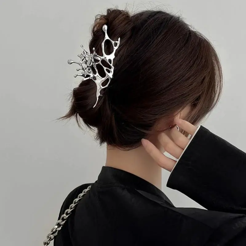 Nape Bun With Abstract Metal Claw Nape Bun With Abstract Metal Claw — Trendy Hair with Clips