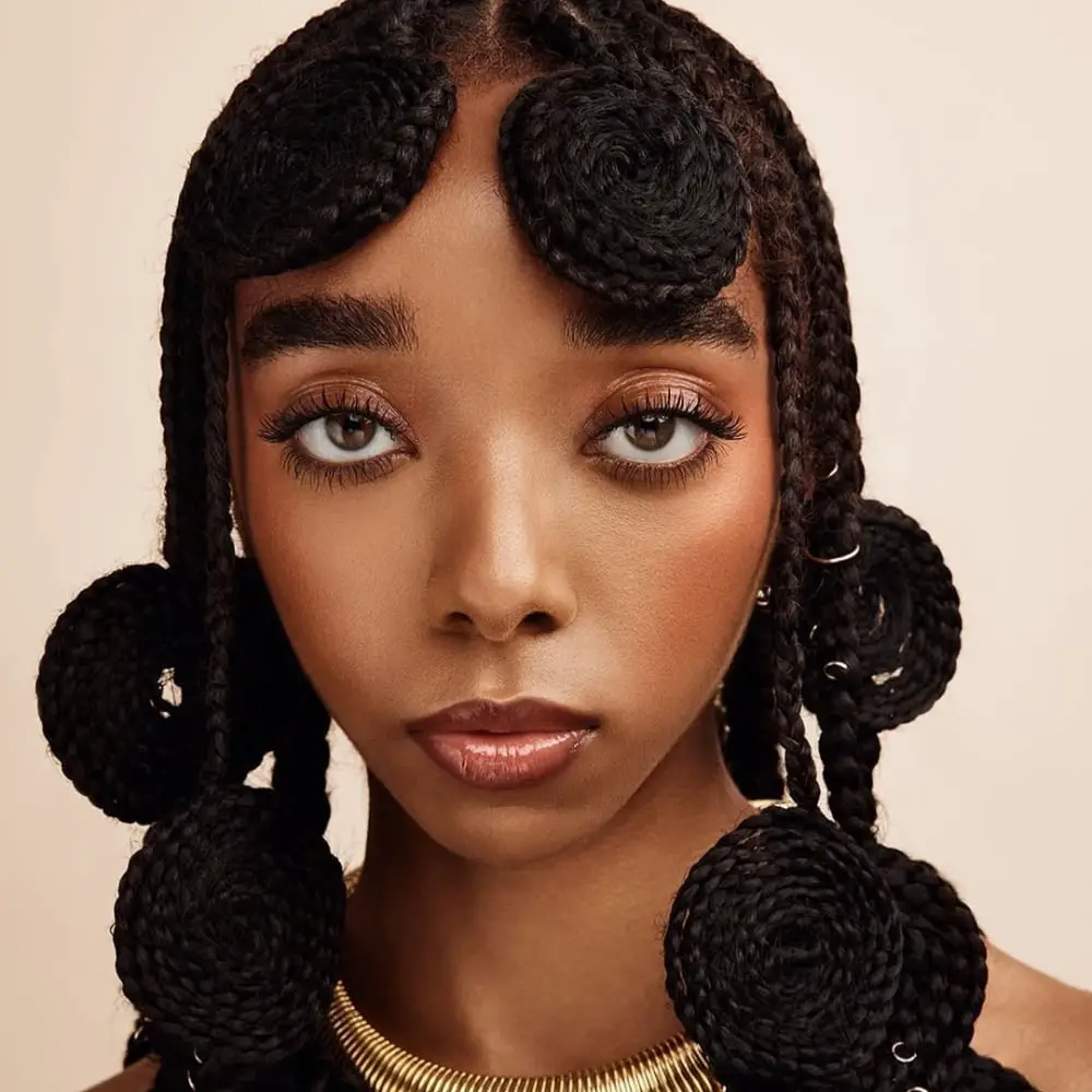 Mid-Back Cornrows with Two-Strand Twists and Wavy Ends Mid-Back Cornrows with Two-Strand Twists and Wavy Ends — Trendy Hairstyles for Black Women Braids