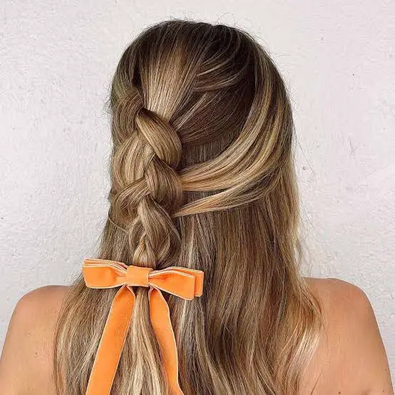 Blonde French Braid With Orange Ribbon Blonde French Braid With Orange Ribbon — Trendy Hairstyles for School