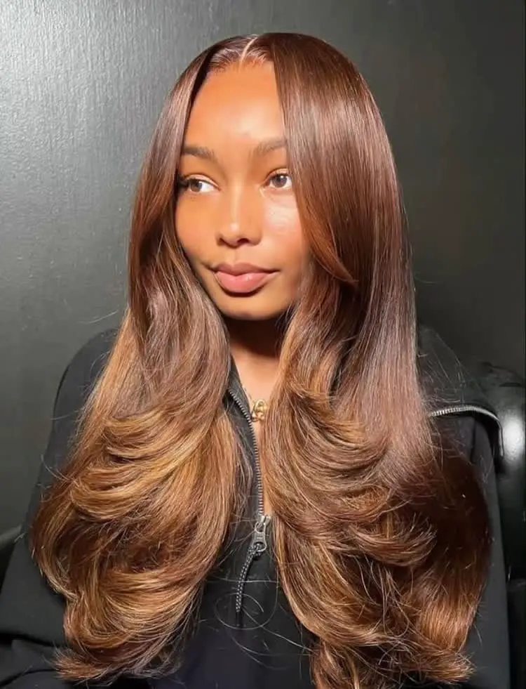 Voluminous Blowout With Curtain Bangs Voluminous Blowout With Curtain Bangs — Trendy Hairstyles for School