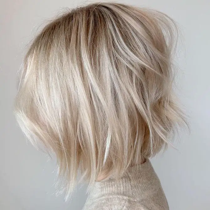 Platinum Blonde Bob With Choppy Bangs Platinum Blonde Bob With Choppy Bangs — Trendy Highlighting Hair