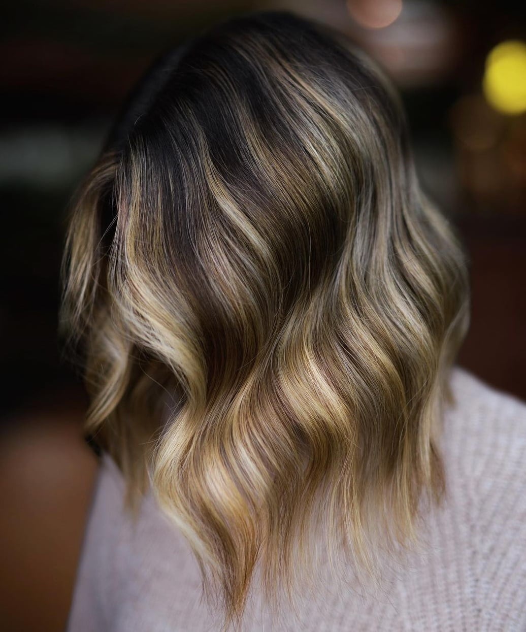 Dark Brown Lob With Subtle Blonde Highlights Dark Brown Lob With Subtle Blonde Highlights — Trendy Highlighting Hair