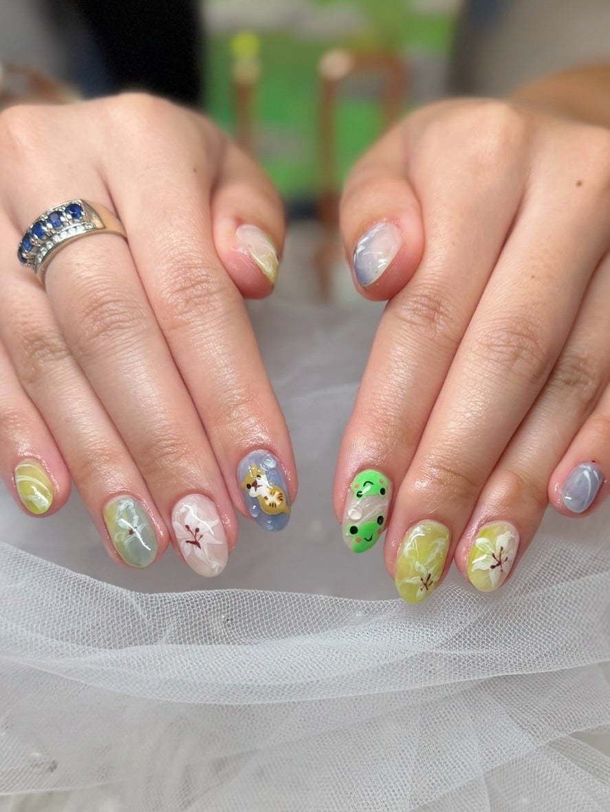 Playful Pastel Cartoon Cat Oval Nails Playful Pastel Cartoon Cat Oval Nails — Trendy Japanese Nails