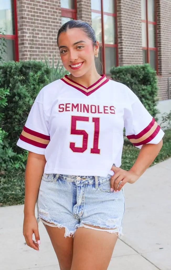 Cropped Jersey Top with Denim Shorts and Gold Earrings, Close-Up Take Cropped Jersey Top with Denim Shorts and Gold Earrings, Close-Up Take — Trendy Jersey Outfit