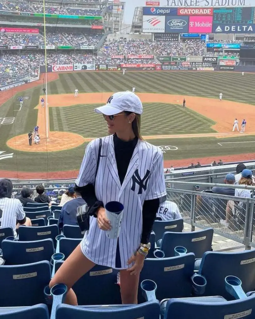 Pinstripe Jersey Over Black Turtleneck with Mini Skirt Pinstripe Jersey Over Black Turtleneck with Mini Skirt — Trendy Jersey Outfit