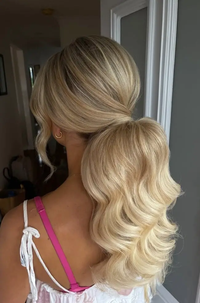 Ash Blonde Low Ponytail With Face-Framing Pieces Ash Blonde Low Ponytail With Face-Framing Pieces — Trendy Low Ponytail Hairstyles