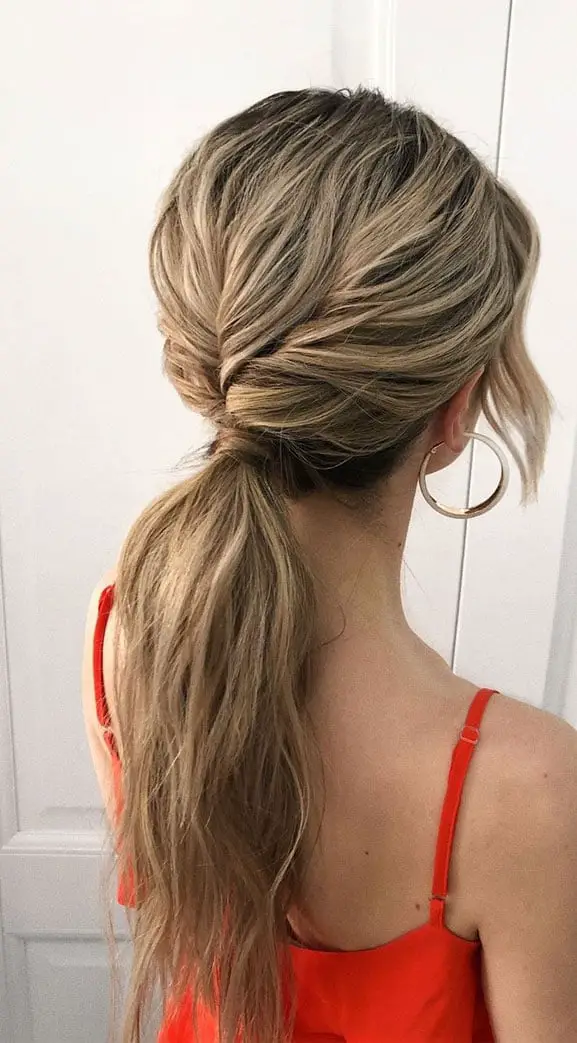 Ash Blonde Low Ponytail With Twisted Detail Ash Blonde Low Ponytail With Twisted Detail — Trendy Low Ponytail Hairstyles