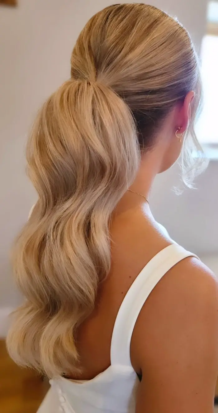 Blonde Low Ponytail With Soft Waves Blonde Low Ponytail With Soft Waves — Trendy Low Ponytail Hairstyles