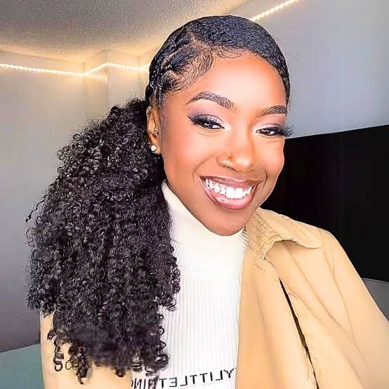 Voluminous Black Curly Low Ponytail Voluminous Black Curly Low Ponytail — Trendy Low Ponytail Hairstyles