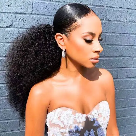 Voluminous Black Curly Ponytail With Middle Part Voluminous Black Curly Ponytail With Middle Part — Trendy Low Ponytail Hairstyles
