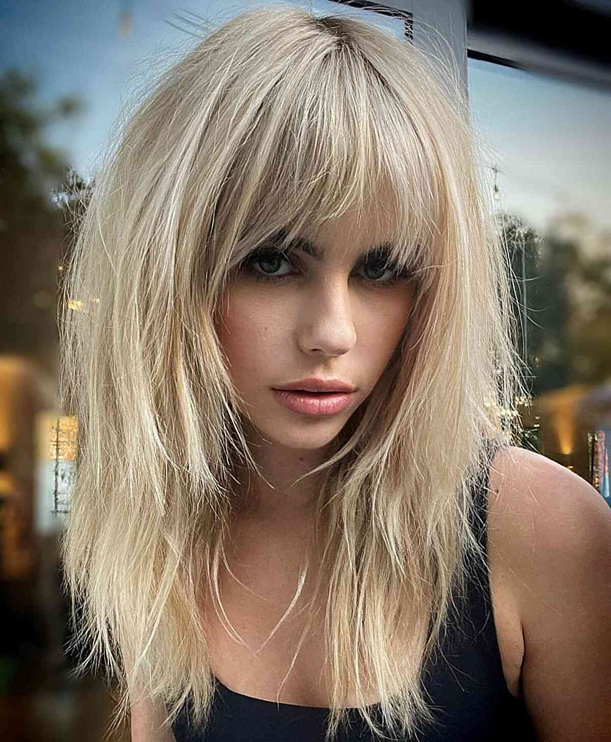 Collarbone Ash Blonde Shag With Full Bangs Collarbone Ash Blonde Shag With Full Bangs — Trendy Modern Shag