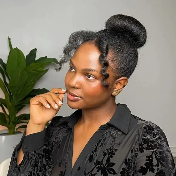 Sleek Black High Bun With Face-Framing Curls Sleek Black High Bun With Face-Framing Curls — Trendy Natural Bun