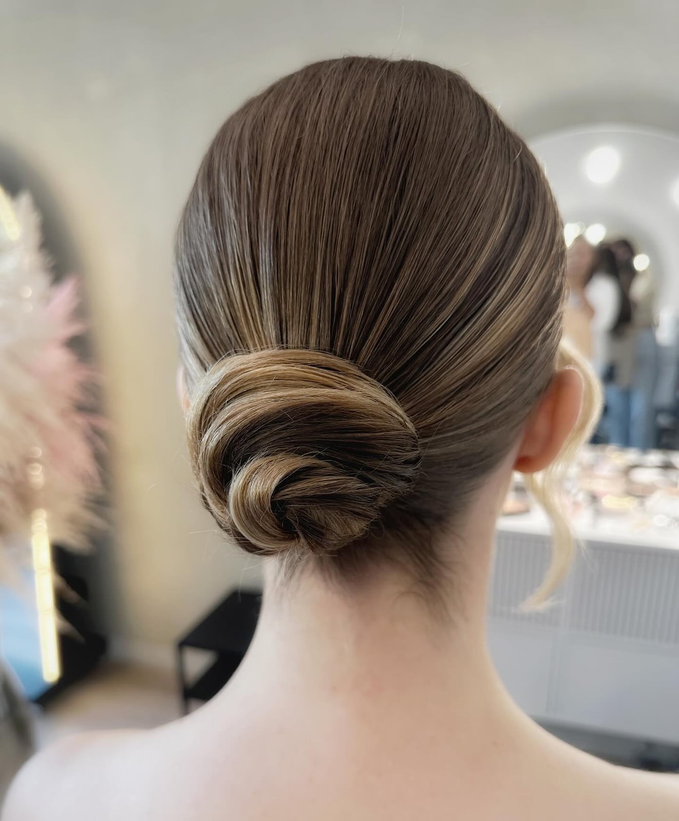 Smooth Twisted Ash Blonde Low Bun Smooth Twisted Ash Blonde Low Bun — Trendy Natural Bun