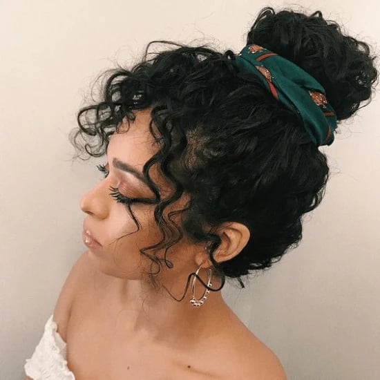 Voluminous Black Curly High Bun Voluminous Black Curly High Bun — Trendy Natural Bun