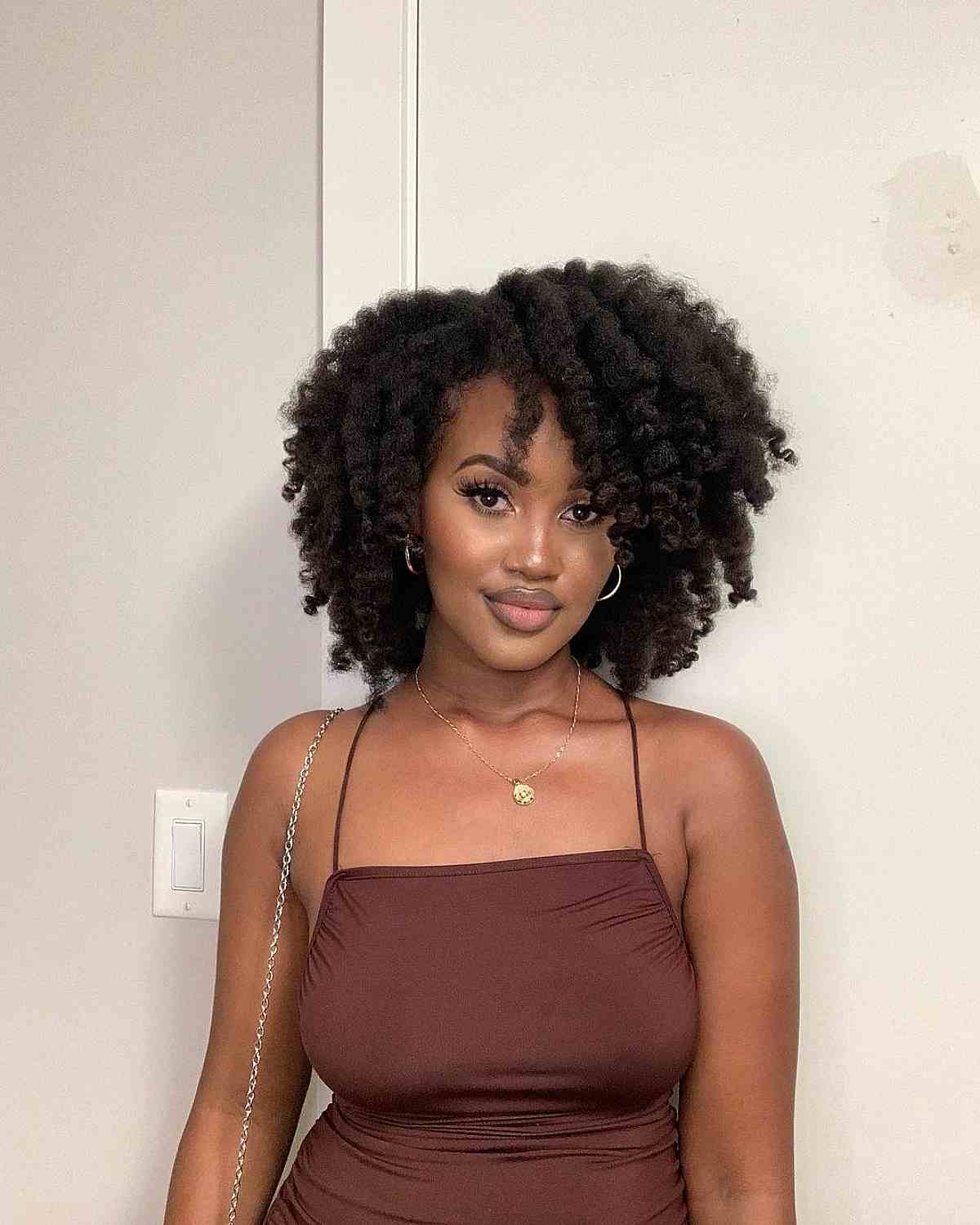 Layered Bob With Glossy Black Blowout — Trendy Natural Hair