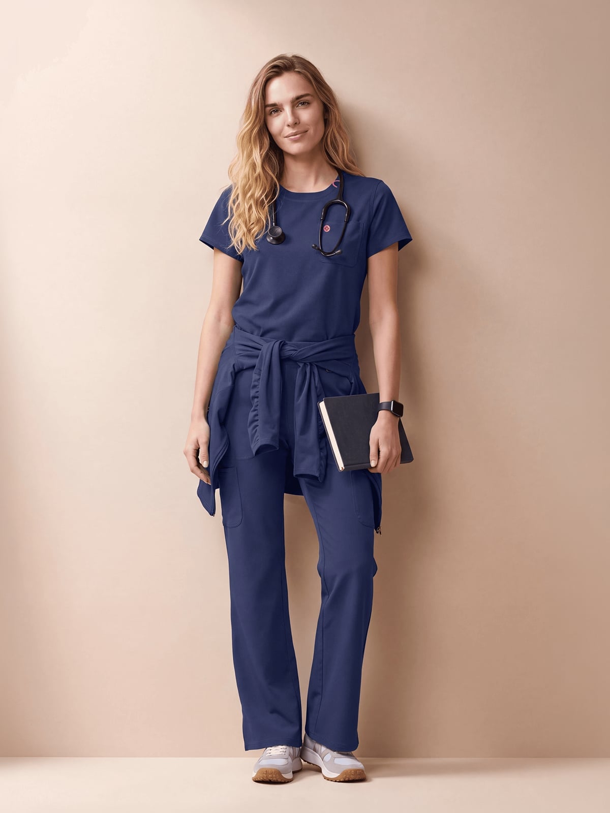 Navy Scrub Set with a Tied Sweater and White Sneakers Navy Scrub Set with a Tied Sweater and White Sneakers — Trendy Nurse Outfits