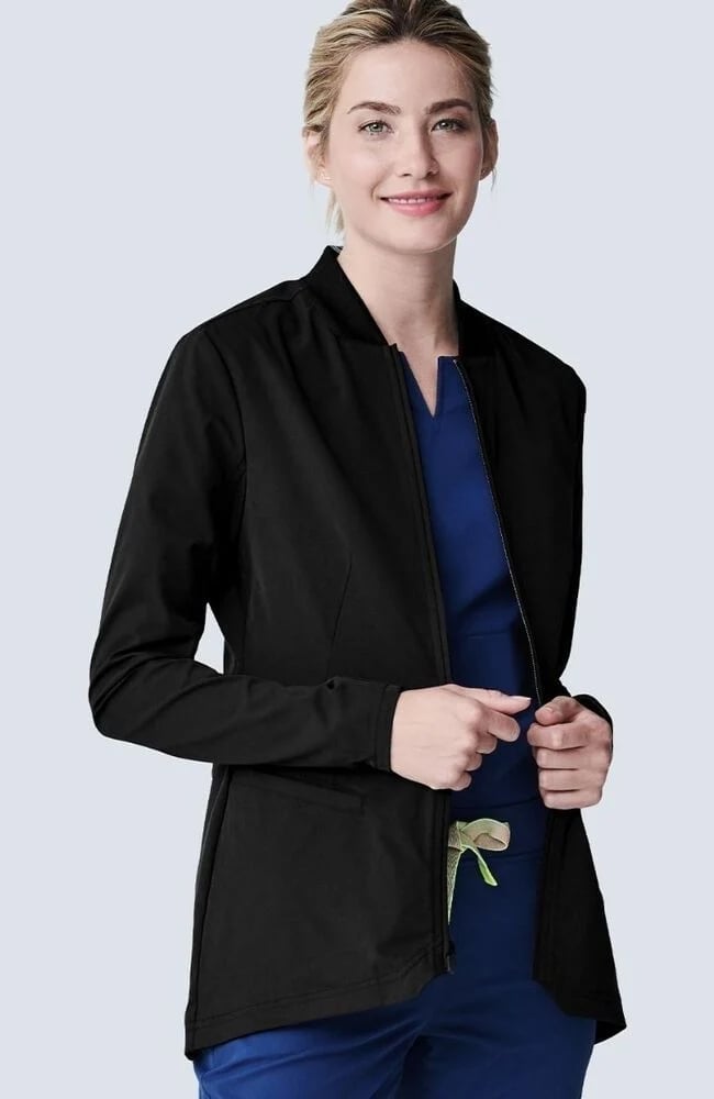 Black Bomber-Style Scrub Jacket Over Blue Scrub Top Black Bomber-Style Scrub Jacket Over Blue Scrub Top — Trendy Nurse Outfits