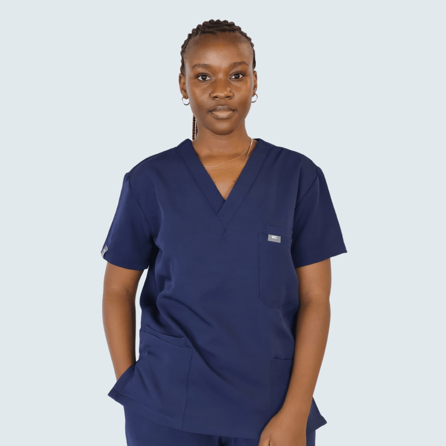 Navy Blue V-neck Scrub Top and Straight-Leg Pants Navy Blue V-neck Scrub Top and Straight-Leg Pants — Trendy Nurse Outfits