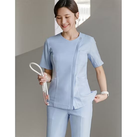 Light Blue Asymmetrical V-neck Scrub Top and Fitted Pants Light Blue Asymmetrical V-neck Scrub Top and Fitted Pants — Trendy Nurse Outfits