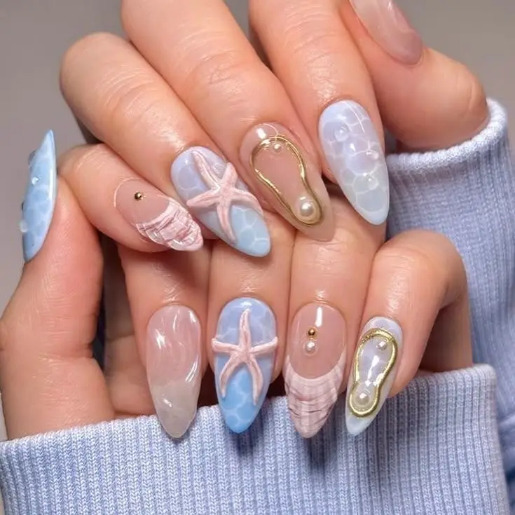 3D Ocean Elements on Medium Almond Nails 3D Ocean Elements on Medium Almond Nails — Trendy Ocean Nails