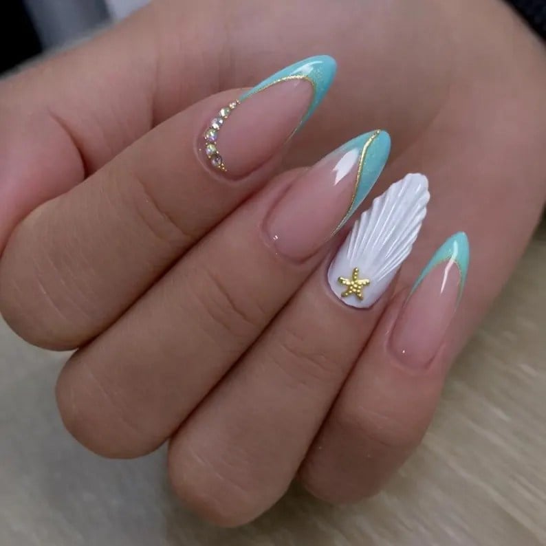 Wavy Blue French Tips with 3D Seashells Wavy Blue French Tips with 3D Seashells — Trendy Ocean Nails