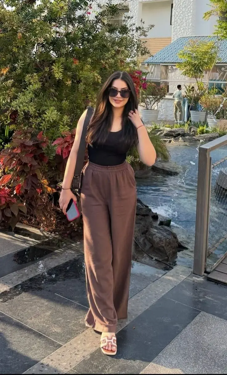Black Tank Top with Wide-Leg Brown Pants Black Tank Top with Wide-Leg Brown Pants — Trendy Outfits for Teens