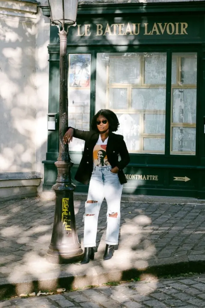 Black Blazer Over Graphic T-Shirt with Ripped Jeans Black Blazer Over Graphic T-Shirt with Ripped Jeans — Trendy Parisian Style