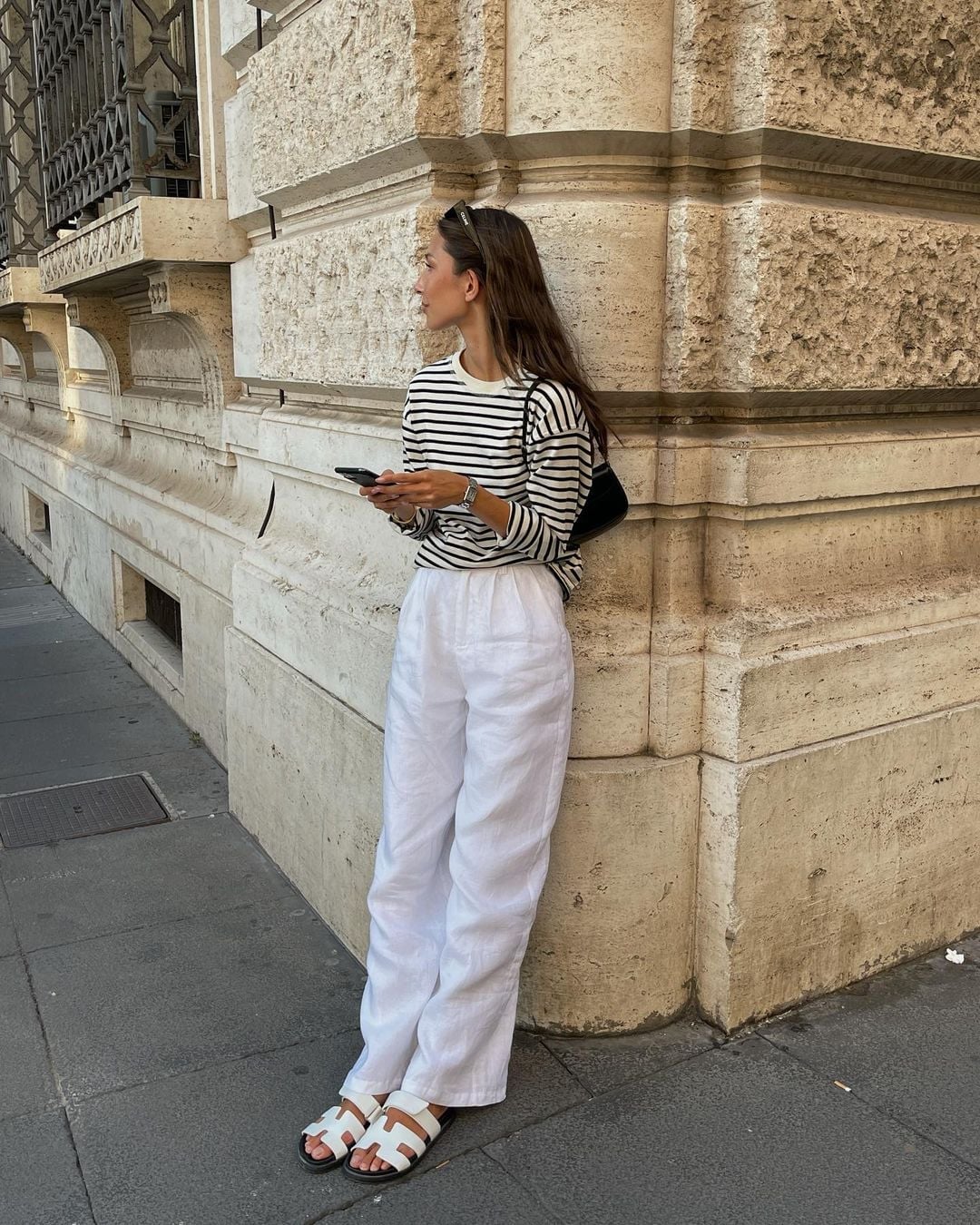 White Linen Trousers with Striped Top and Black Shoulder Bag White Linen Trousers with Striped Top and Black Shoulder Bag — Trendy Photo Outfit