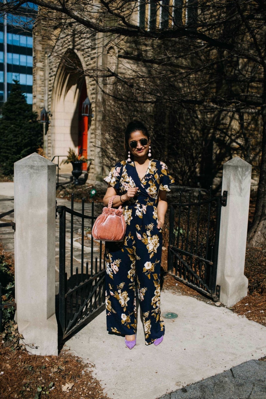 Floral Print Jumpsuit with Purple Heels and Pink Velvet Handbag Floral Print Jumpsuit with Purple Heels and Pink Velvet Handbag — Trendy Photo Outfit