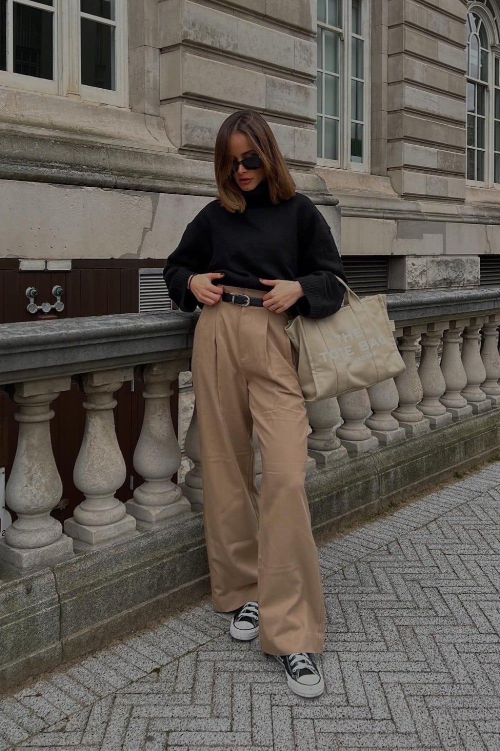 Black Turtleneck with Wide-Leg Beige Trousers Black Turtleneck with Wide-Leg Beige Trousers — Trendy Photo Outfit