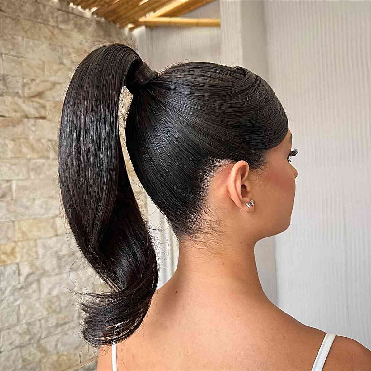 Polished Mid-Back Sleek Ponytail Polished Mid-Back Sleek Ponytail — Trendy Quick Weave Ponytail