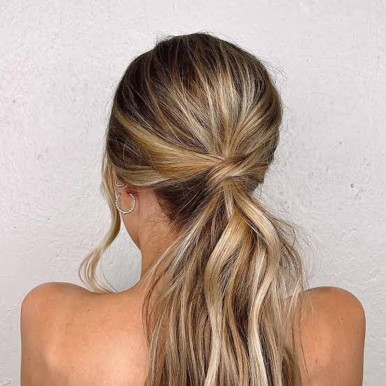 Low Ponytail With Twisted Knot Detail Low Ponytail With Twisted Knot Detail — Trendy Quick Weave Ponytail