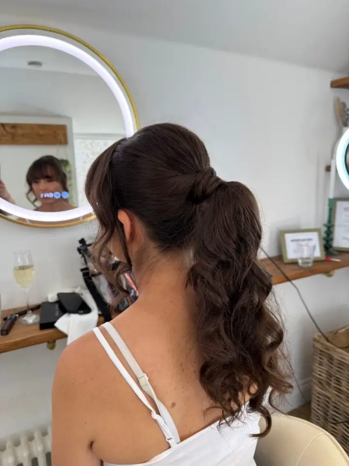 Dark Brown Ponytail With Twisted Detail Dark Brown Ponytail With Twisted Detail — Trendy Quick Weave Ponytail