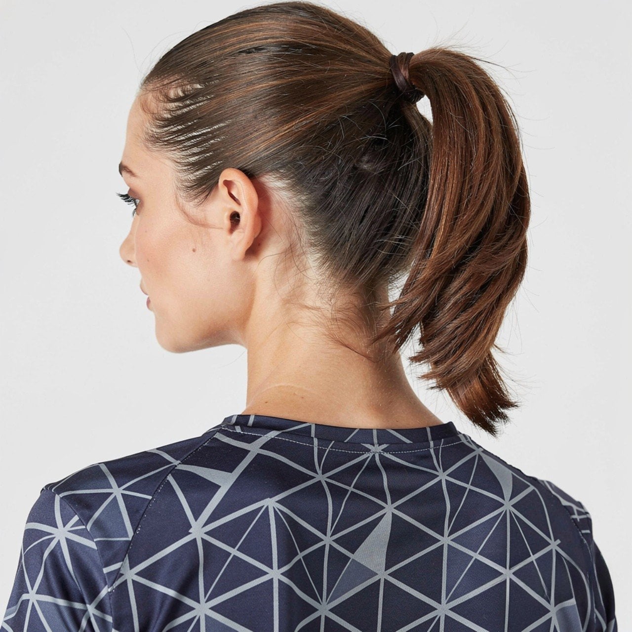 Sleek Dark Brown Mid-Back Ponytail Sleek Dark Brown Mid-Back Ponytail — Trendy Quick Weave Ponytail