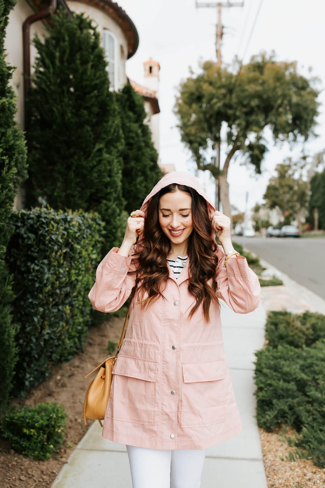 Pink Hooded Parka Over Striped Top Pink Hooded Parka Over Striped Top — Trendy Rain Jacket Outfits