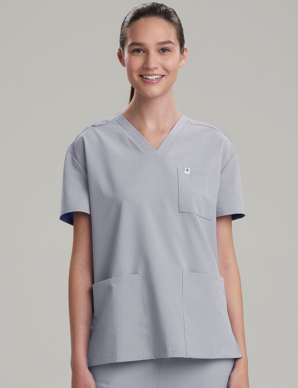 Gray V-Neck Scrub Top With Minimalist Pockets — Trendy Scrubs Outfits