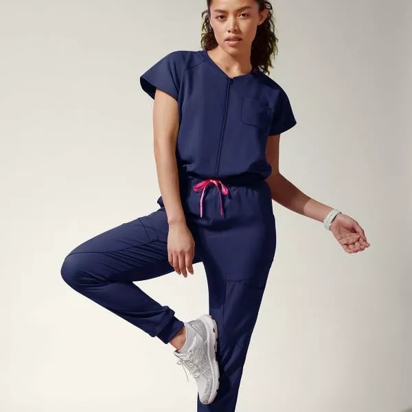 Navy Scrub Jumpsuit With Pink Drawstring — Trendy Scrubs Outfits