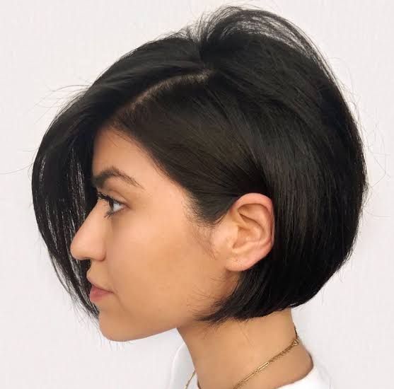 Voluminous Dark Brown Bob With Side Bangs — Trendy Short Hair
