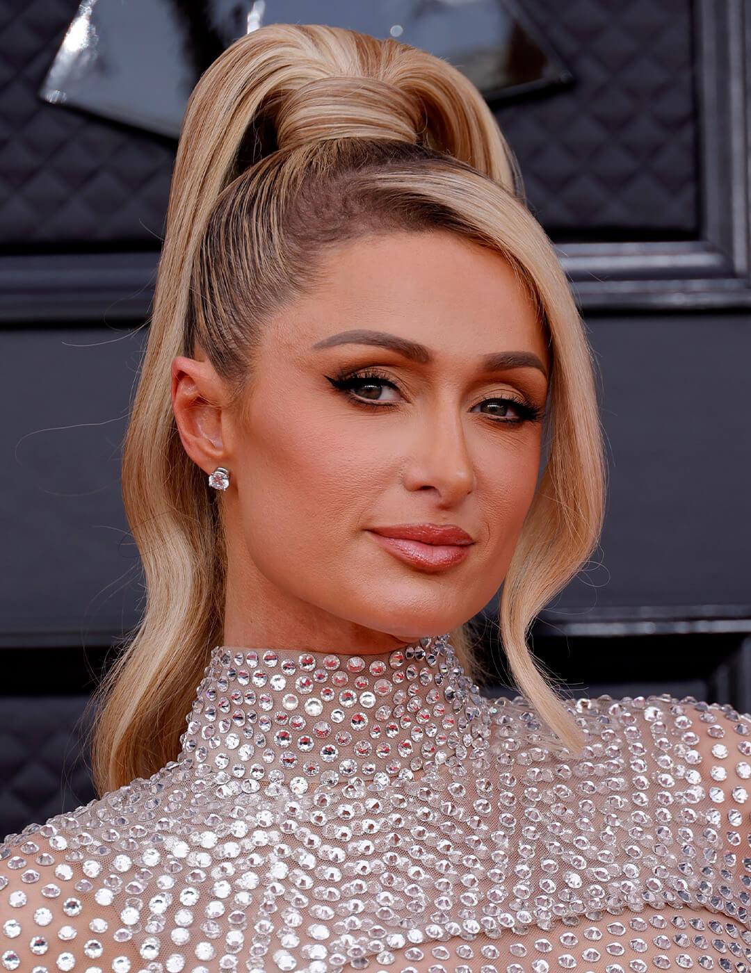 High Sleek Blonde Ponytail With Face-Framing Tendrils — Trendy Sleek Ponytail