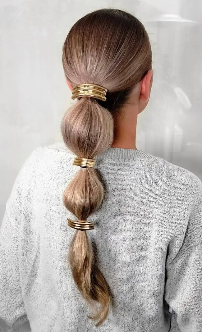 Bubble Ponytail Ash Blonde With Gold Cuffs — Trendy Sleek Ponytail