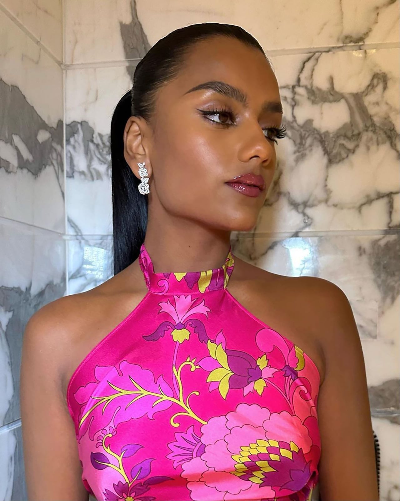 Sharp Black Slicked Ponytail Sharp Black Slicked Ponytail — Trendy Slick Back Ponytail