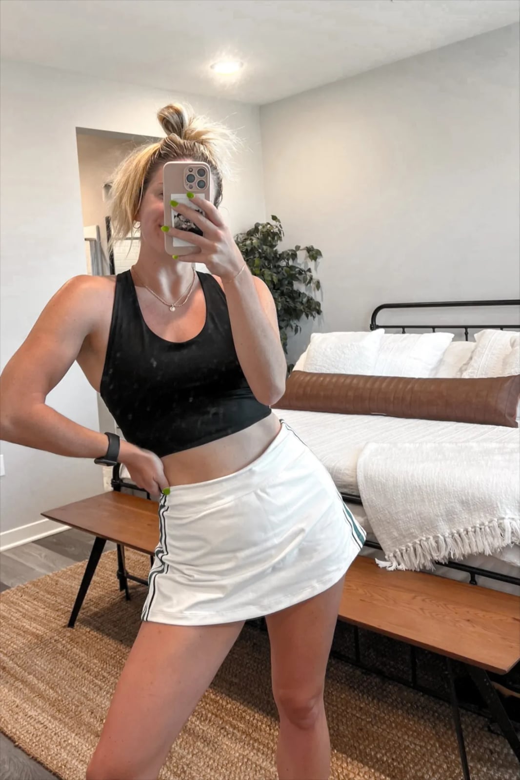 Black Sports Bra with Striped White Mini Skirt Black Sports Bra with Striped White Mini Skirt — Trendy Tennis Outfits