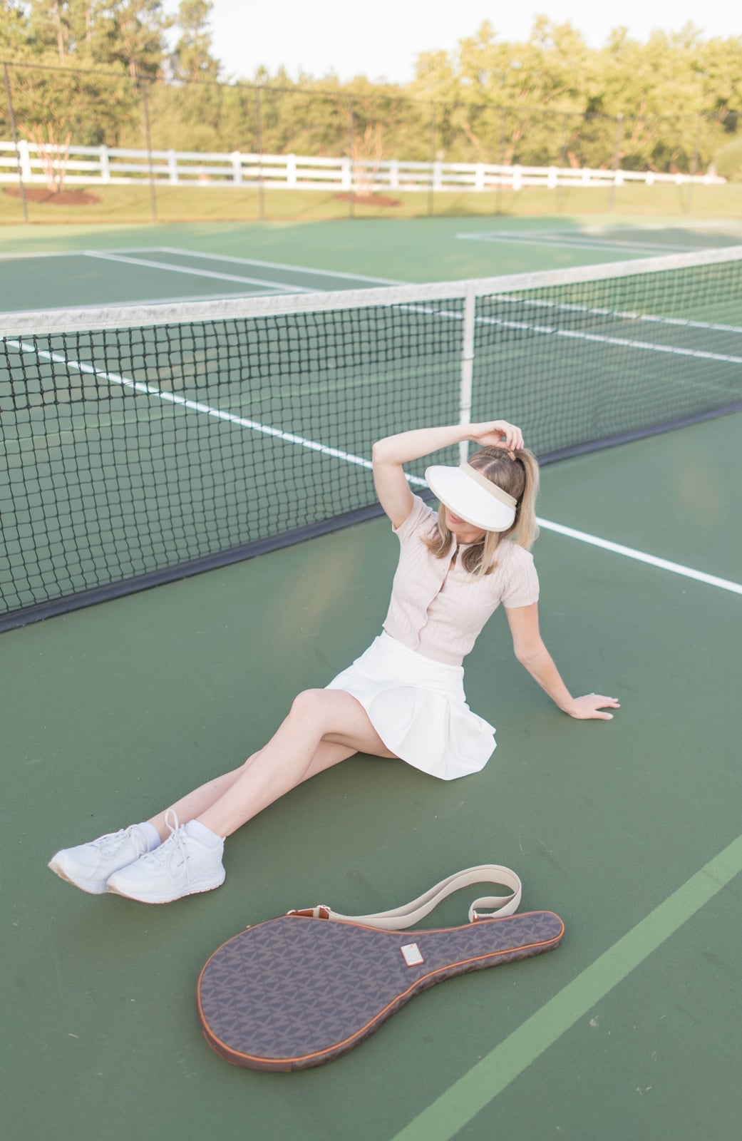 Pale Pink Knit Top and White Pleated Mini Skirt Pale Pink Knit Top and White Pleated Mini Skirt — Trendy Tennis Outfits