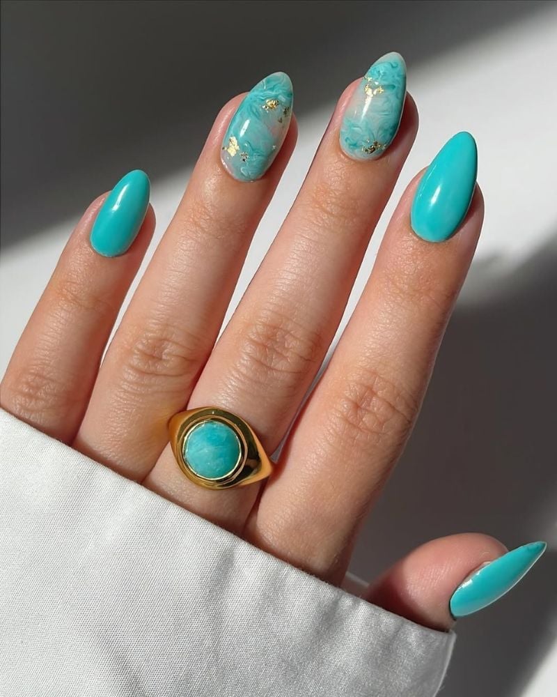 Vibrant Turquoise Marbling with Gold Foil Vibrant Turquoise Marbling with Gold Foil — Trendy Turquoise Nails