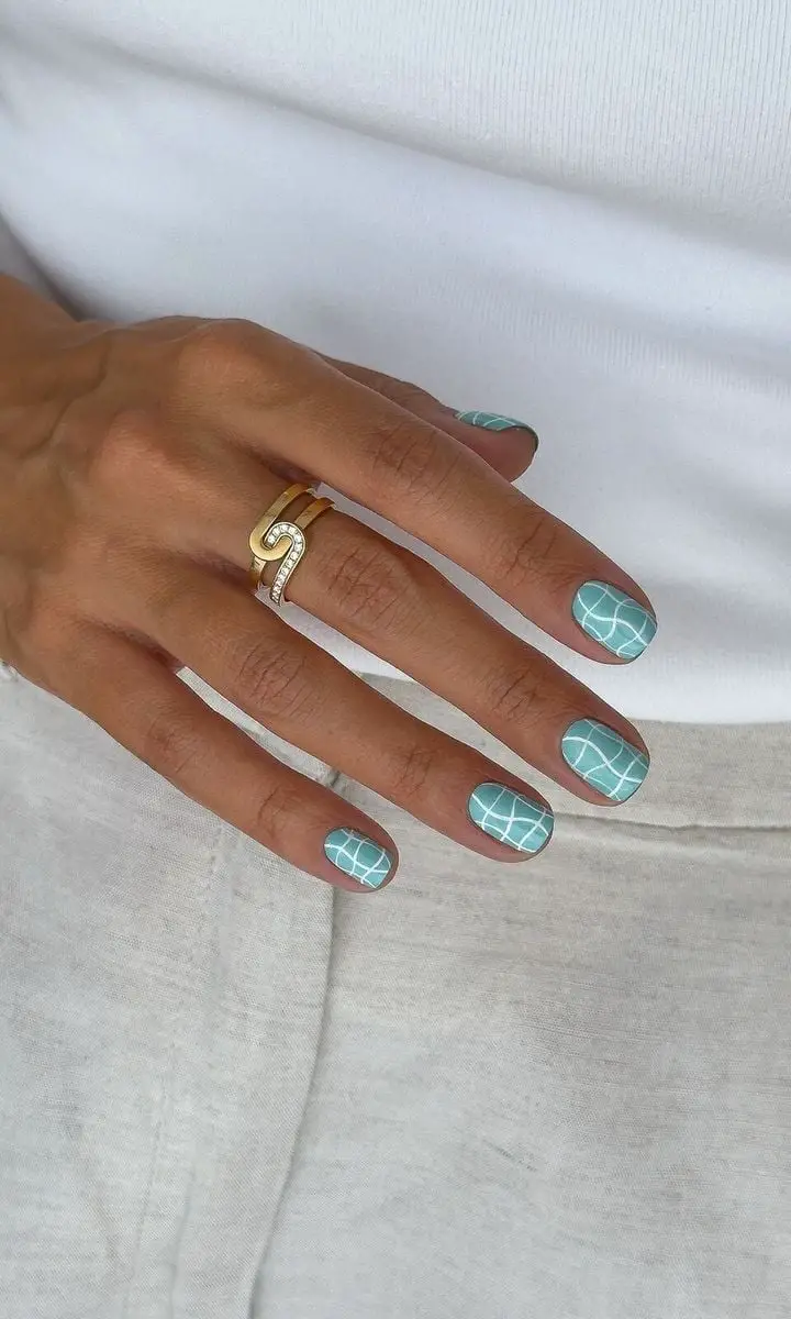 Short Almond Turquoise with White Grid Short Almond Turquoise with White Grid — Trendy Turquoise Nails