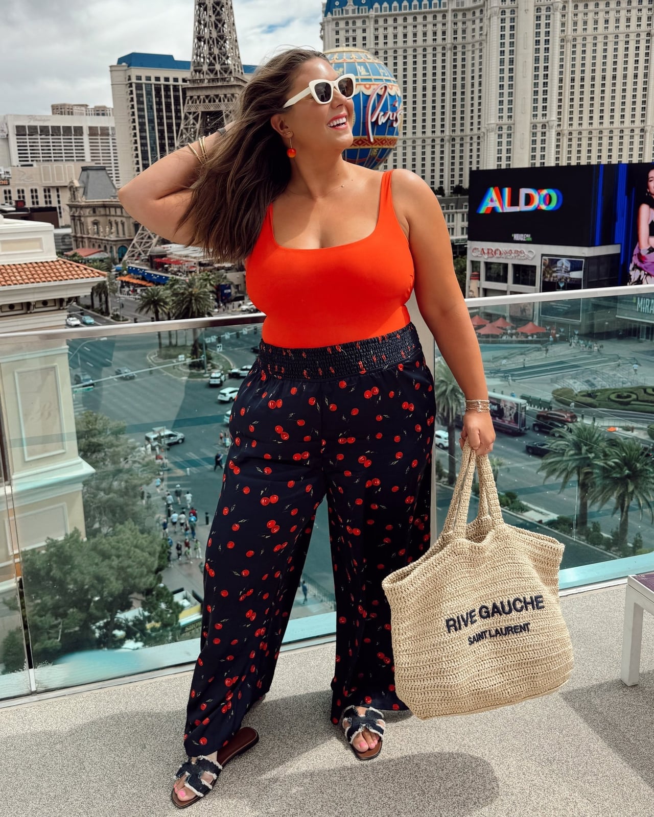 Orange Tank with Cherry Print Wide-Leg Pants Orange Tank with Cherry Print Wide-Leg Pants — Trendy Vegas Outfits